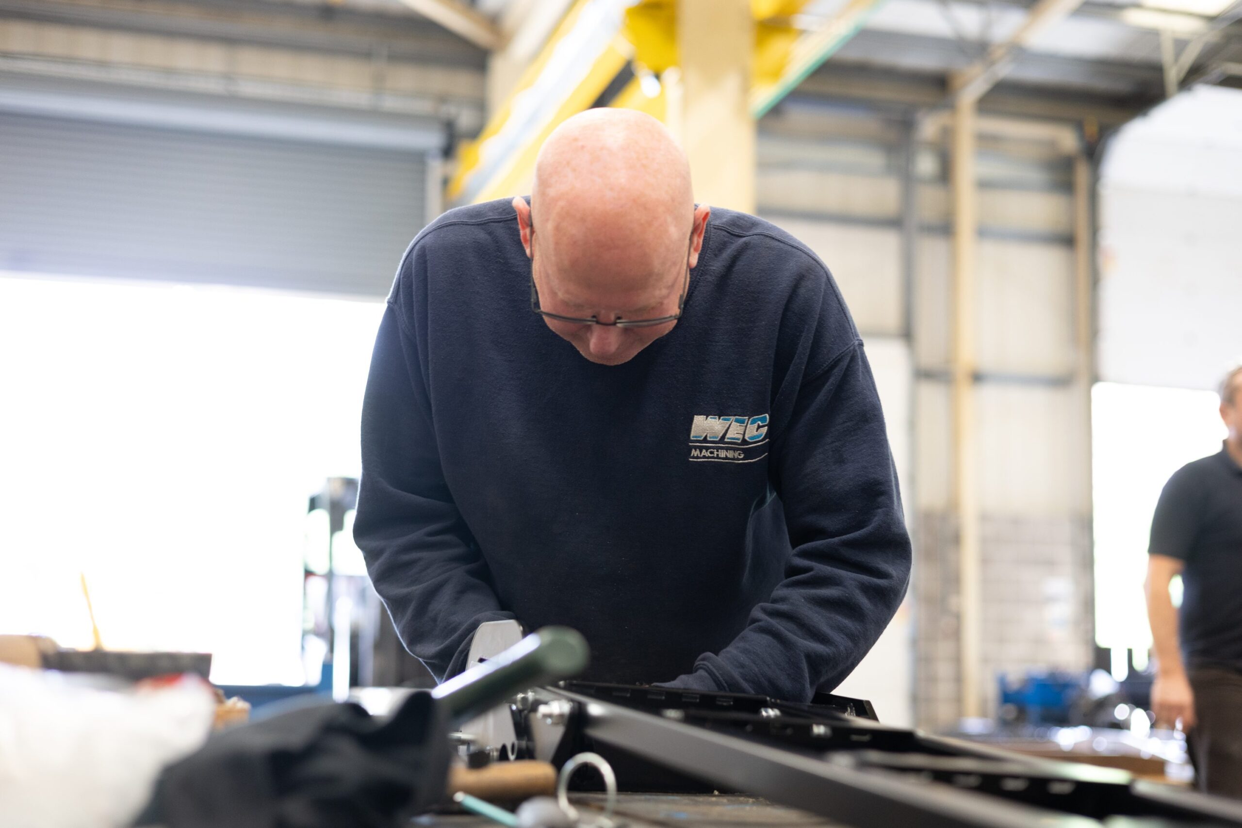 assembly operative putting parts together in factory