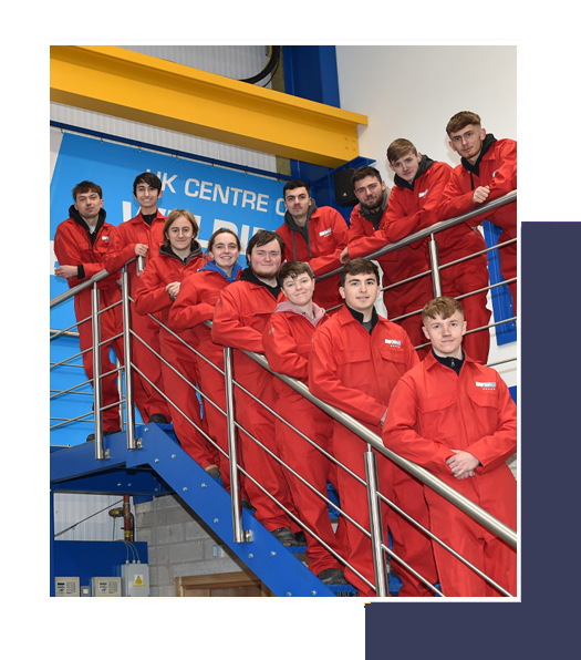 wec engineering academy apprentices stood on steps